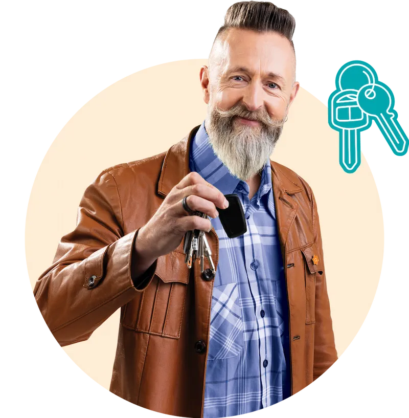 A middle-aged man with grey beard and a brown leather jacket, holding a set of keys